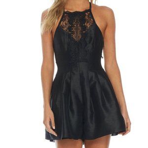 Black Romper with lace details by Free People!